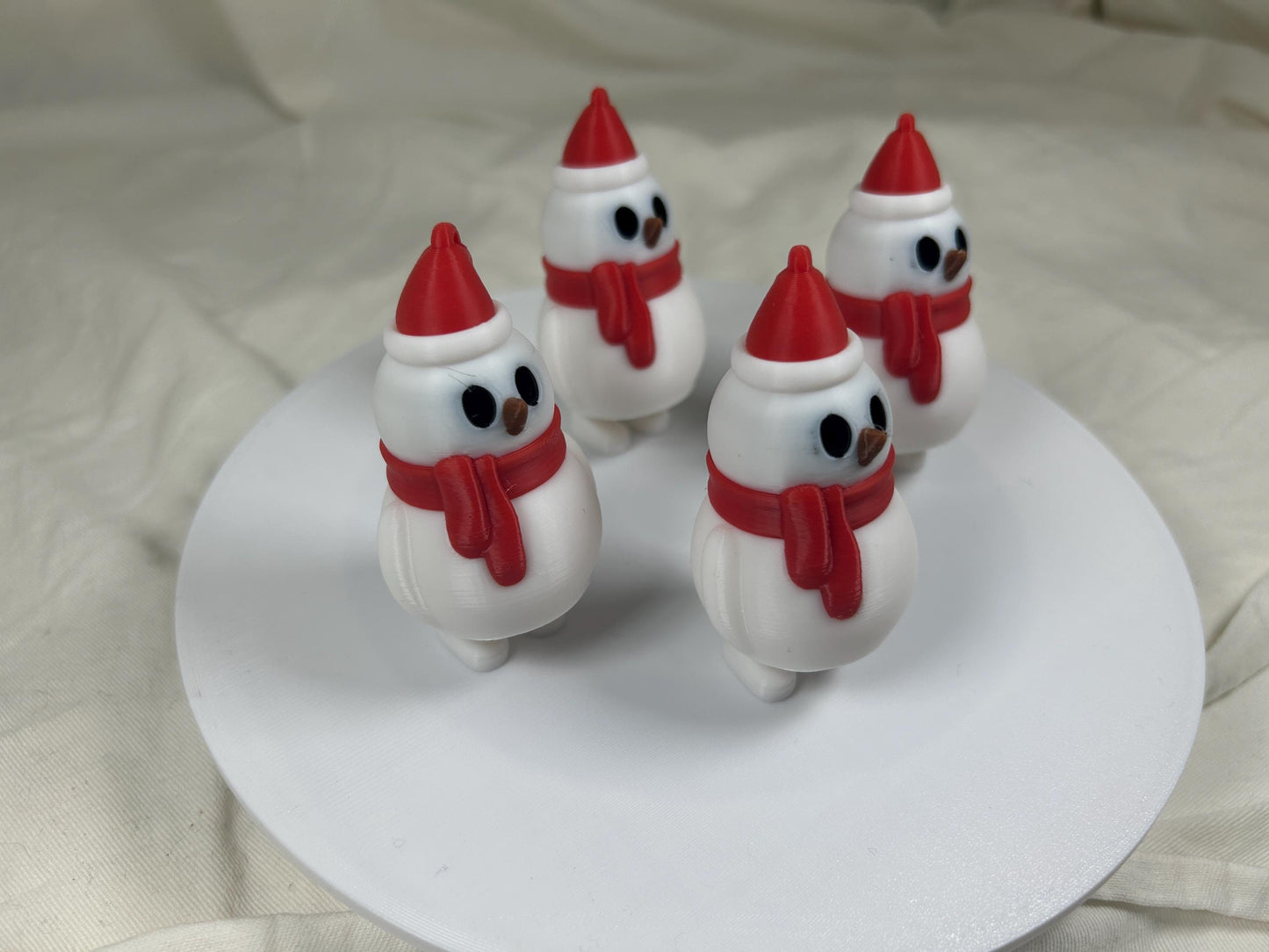 Schneemann-4er Set mit Schal, Mütze und herabbaumelnden Füßchen - Festliche Weihnachtsdeko, Christbaumdeko, Christbaumschmuck