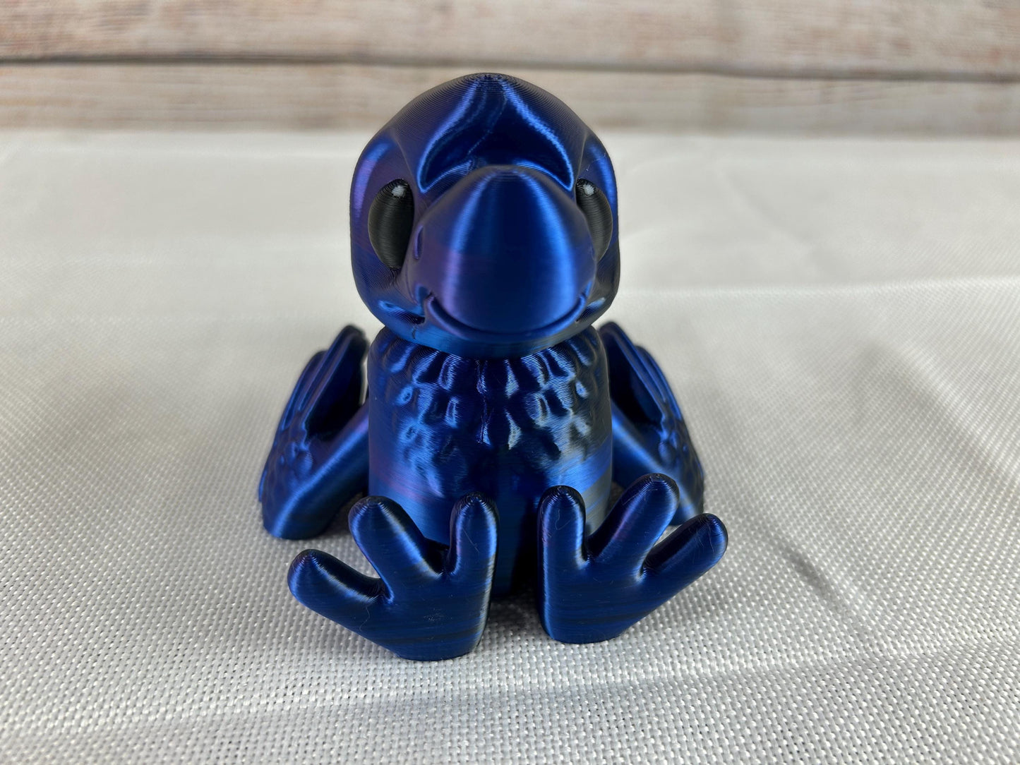 Dodo – Interaktive bewegliche 3D-gedruckte Figur in Dunkelblau, flattert mit den Flügeln wenn man die Beine bewegt - Deko-Highlight