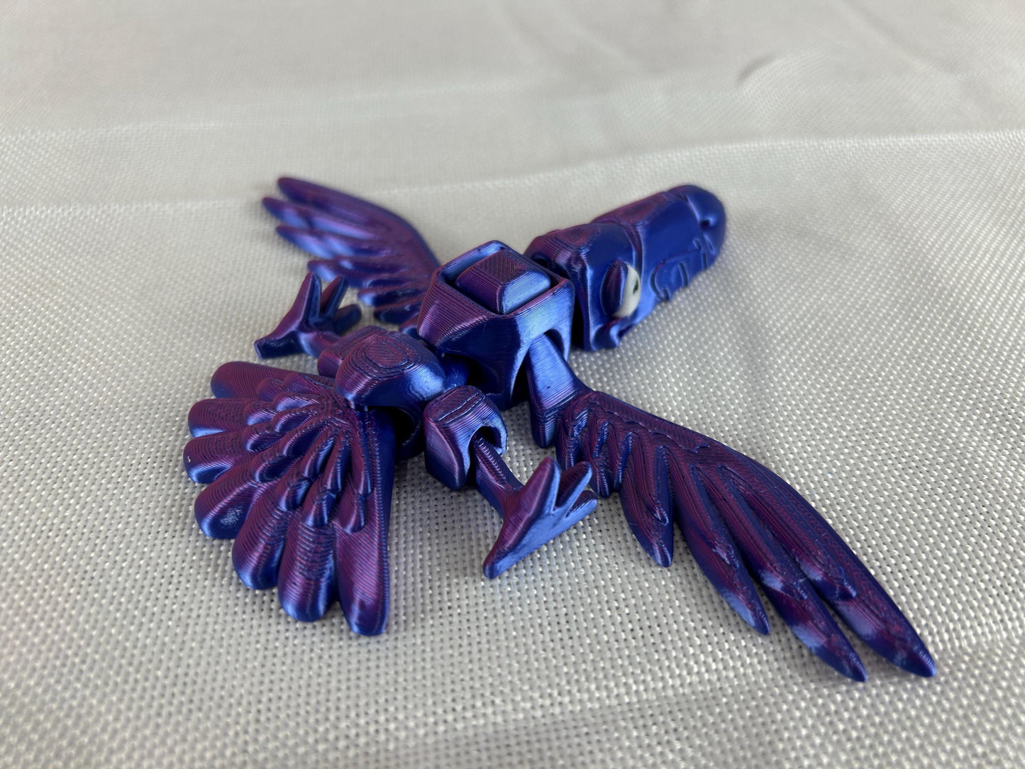 Vogelspecht Tukan, interaktive Dekoration in Violettblau, Flügelschlag-Mechanismus, einzigartiges Geschenk