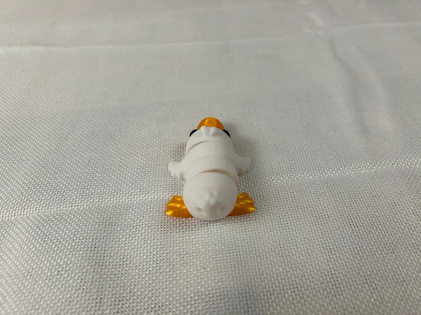 Ente beweglich, weiß - orange, aus PLA, Deko-Ente, dekorative Schreibtischfigur, modernes Wohnaccessoire, Geschenkidee