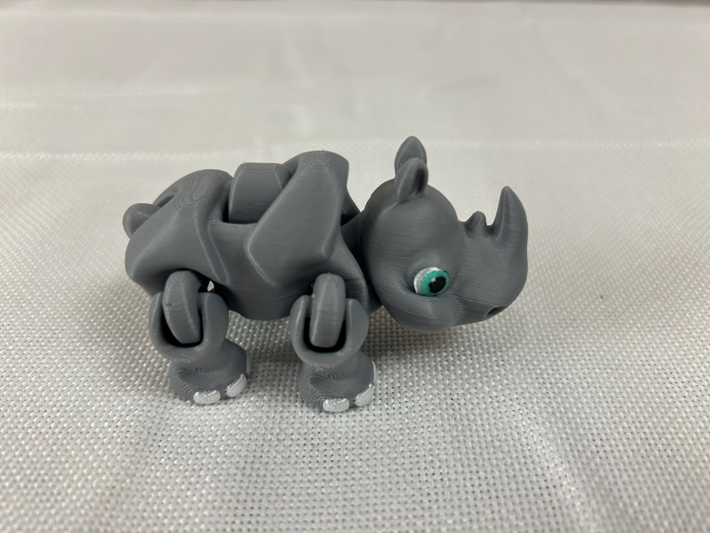 Rhinozeros, grau, beweglich, mit Laufmechanismus aus PLA, bewegliche Gliedmaßen – Graue Dekofigur mit Laufmechanismus, Regaldeko, Tischdeko