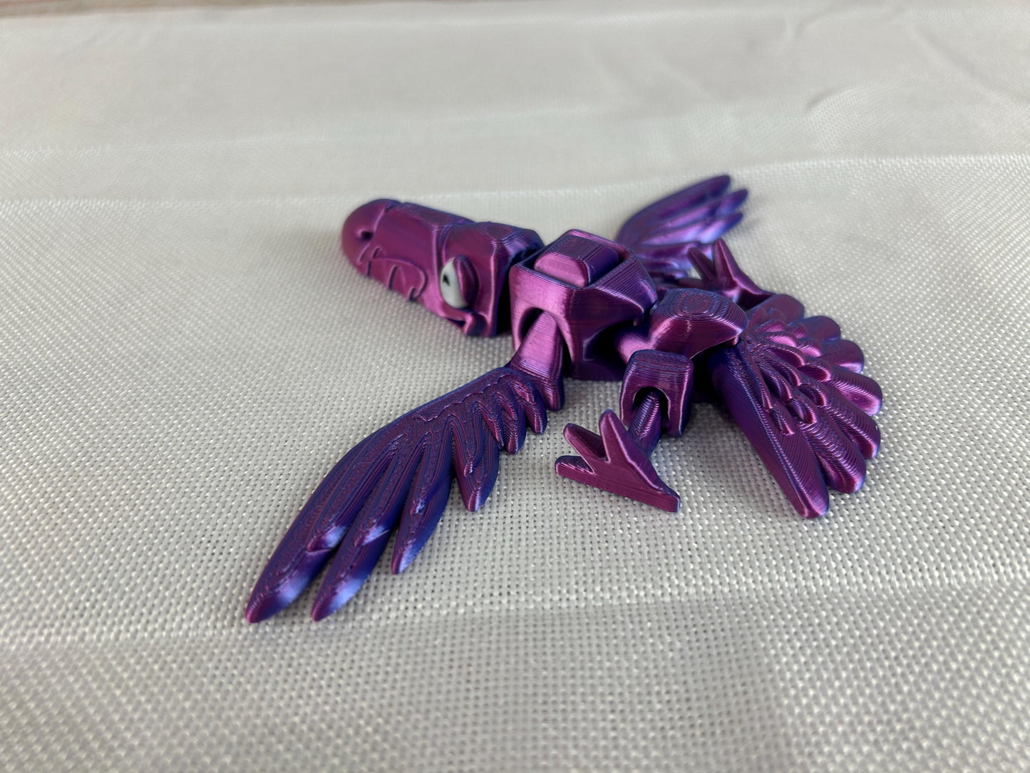 Vogelspecht Tukan, interaktive Dekoration in Violettblau, Flügelschlag-Mechanismus, einzigartiges Geschenk