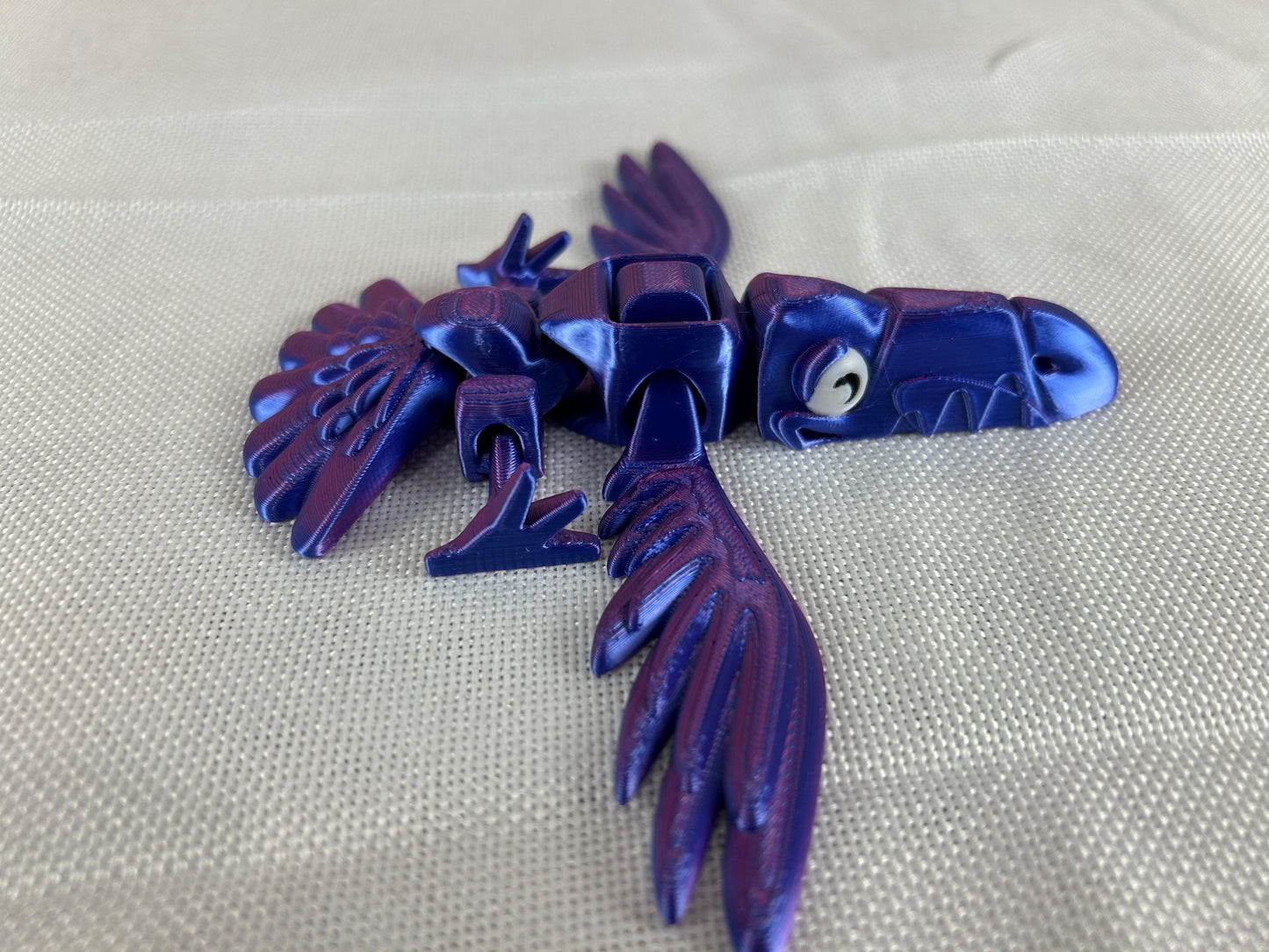 Vogelspecht Tukan, interaktive Dekoration in Violettblau, Flügelschlag-Mechanismus, einzigartiges Geschenk